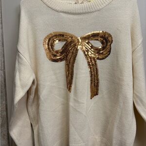 JODIFL Cream Sweater with Gold Sequin Bow